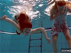 torrid Russian nymphs swimming in the pool